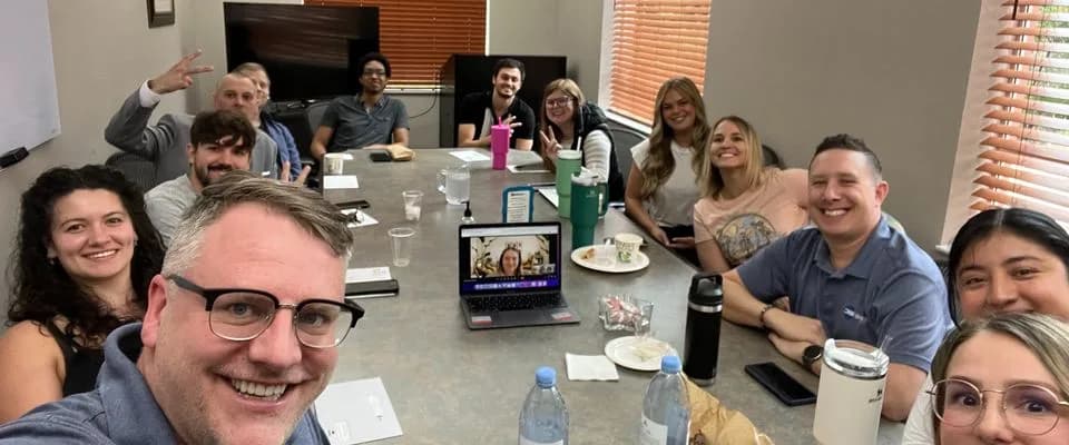 The DigiSphere Marketing team around the conference table at the Lakewood Ranch office