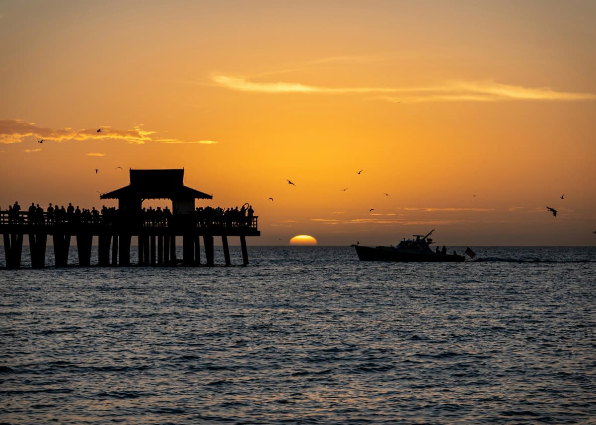 Naples Pier extending into the Gulf of Mexico in Naples, Florida