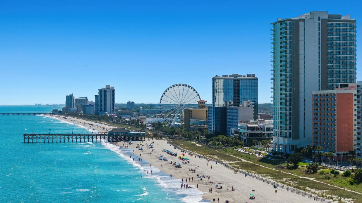 The Myrtle Beach SkyWheel beside the oceanfront boardwalk and beach