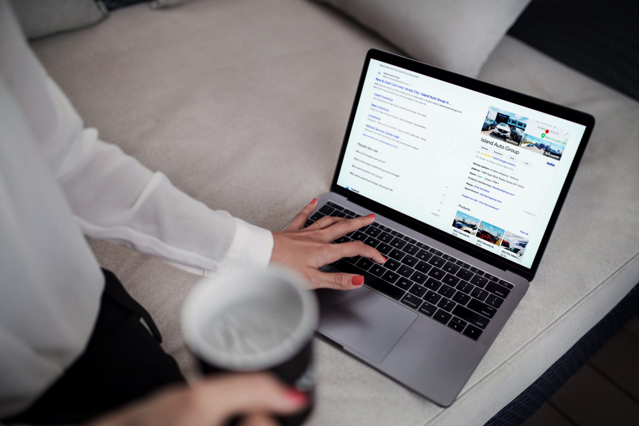 hand touching laptop